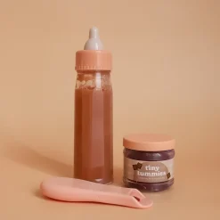 Tiny Harlow Biberon Mágico y Tiny Potito Chocolate con cuchara para muñecos · Online